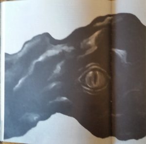 Yep. That's a creepy yellow eye looking out of that black ooze. Yikes!